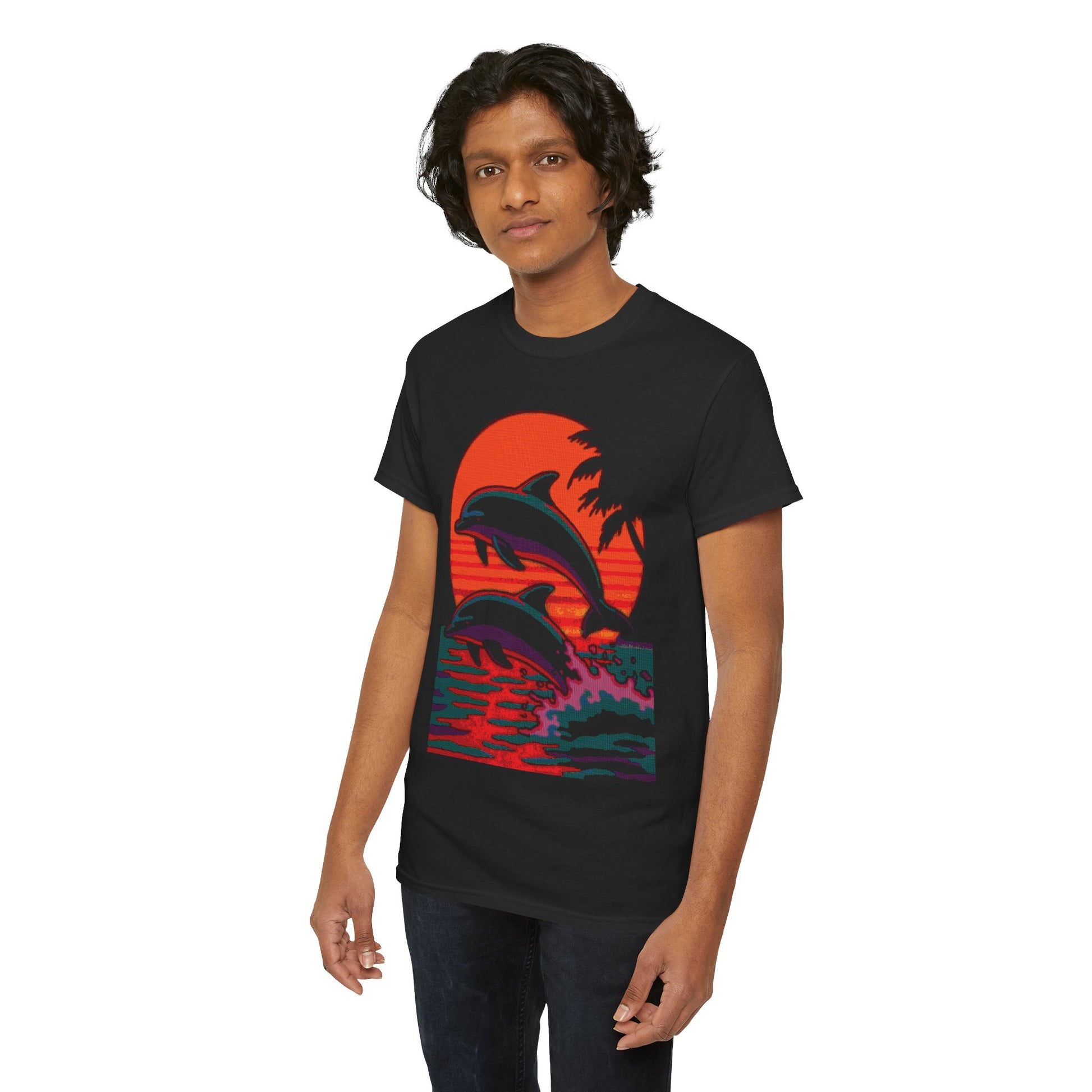 Man wearing Dithered Retro Design of two dolphins jumping out of the water in front of a sunset with tropical palm trees on a black shirt