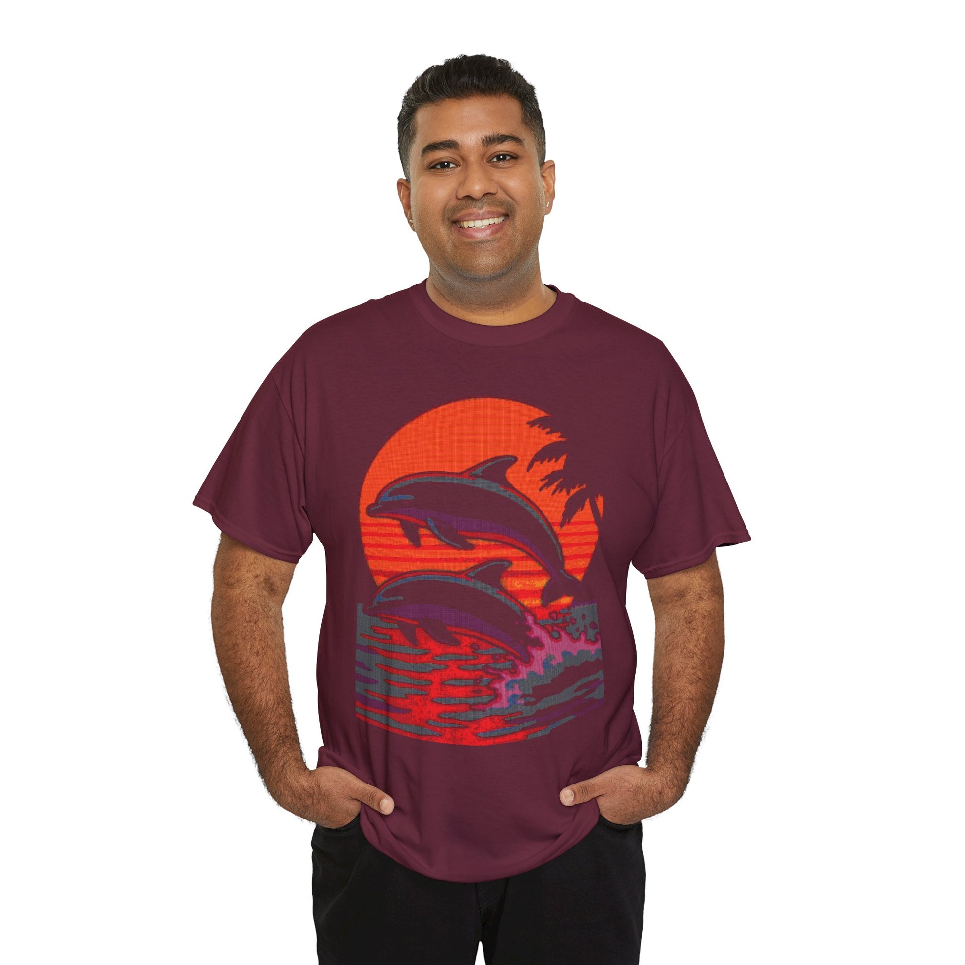 Man wearing Dithered Retro Design of two dolphins jumping out of the water in front of a sunset with tropical palm trees on a Maroon shirt
