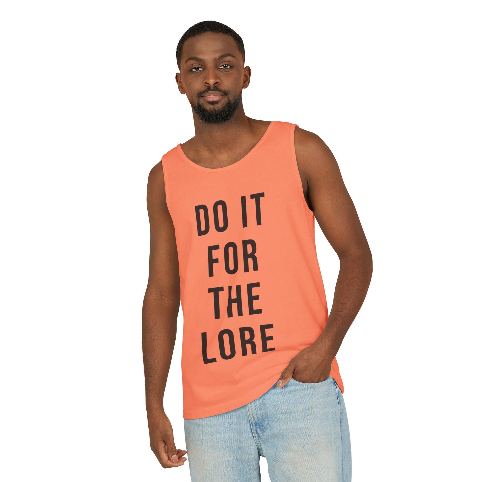 Man wearing Orange Melon Tank Top with the bold text "DO IT FOR THE LORE" 