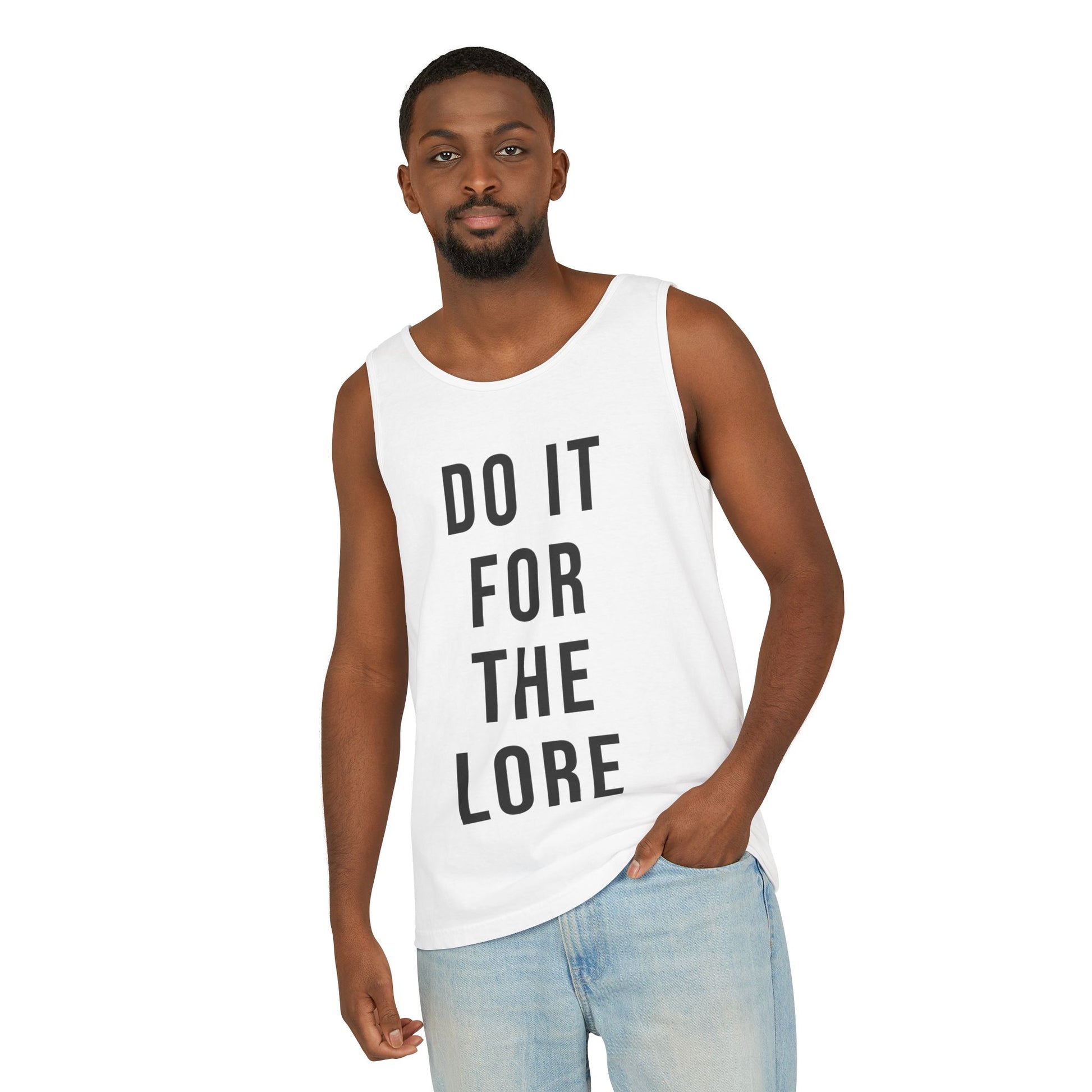 Man wearing White Tank Top with the bold text "DO IT FOR THE LORE" 