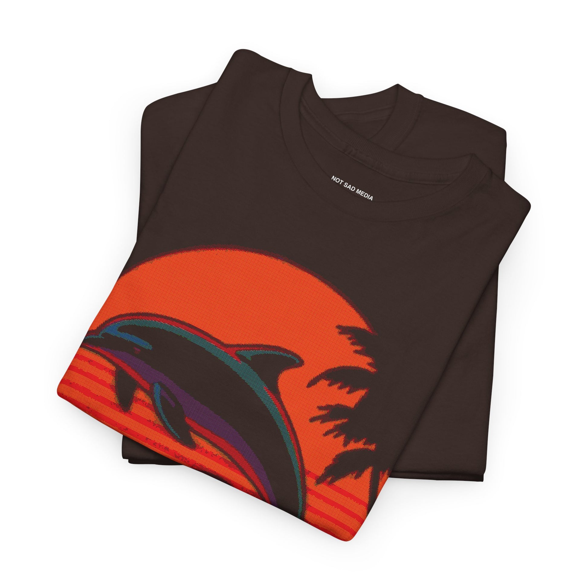 Folded Dithered Retro Design of two dolphins jumping out of the water in front of a sunset with tropical palm trees on a brown shirt