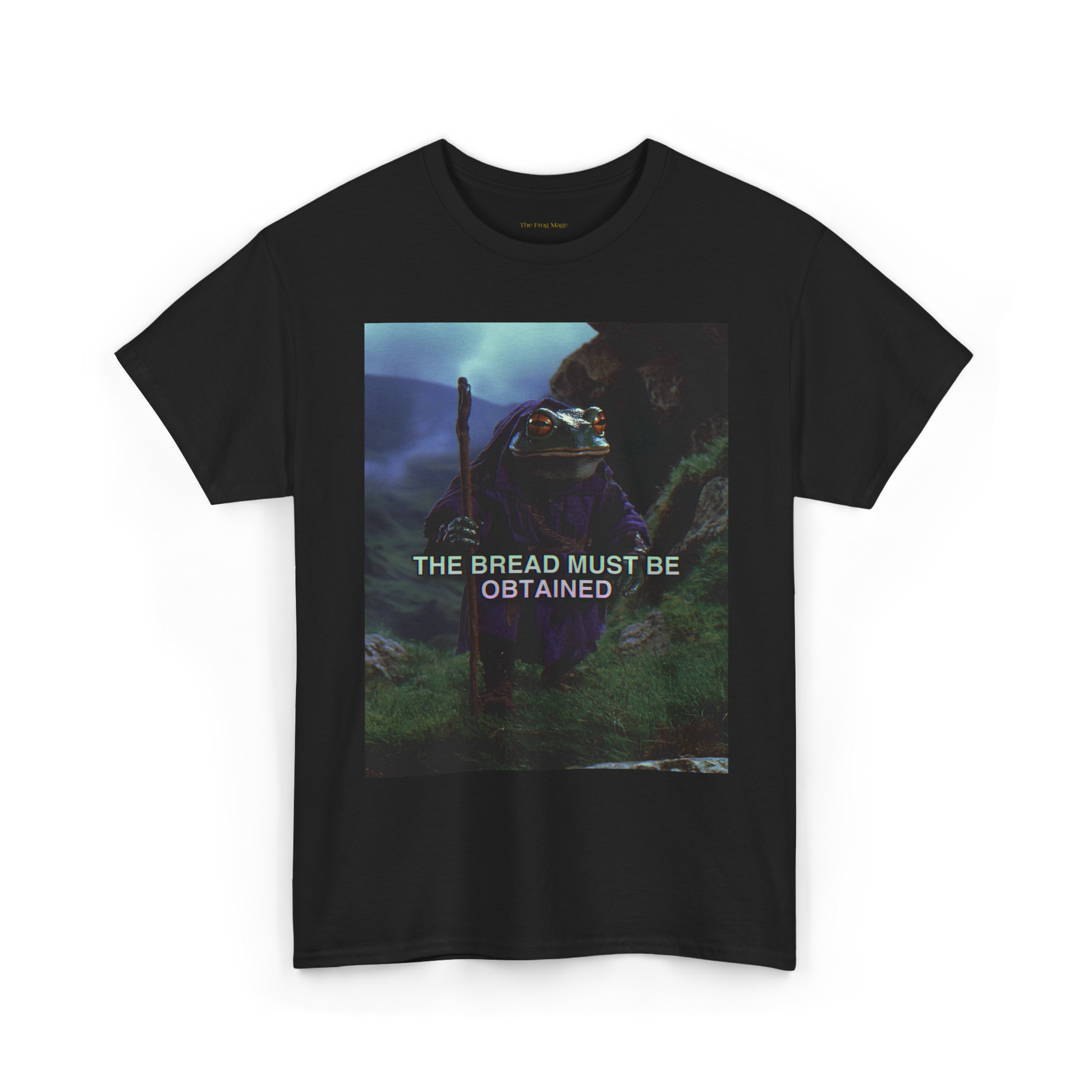 Black t-shirt with an image of a frog character and the text 'THE BREAD MUST BE OBTAINED' on the front.
