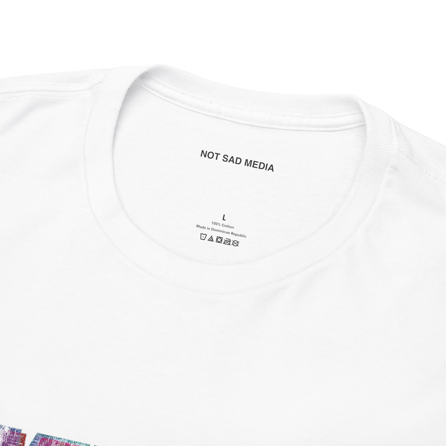 White t-shirt with 'NOT SAD MEDIA' text on a white background