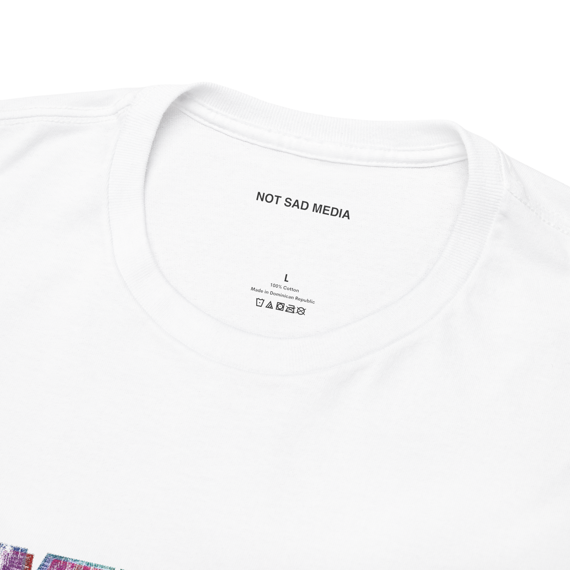 White t-shirt with 'NOT SAD MEDIA' text on a white background